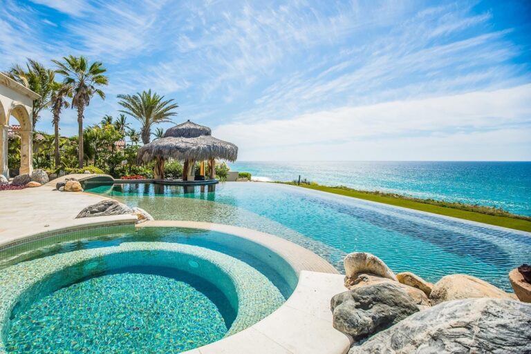 The pool and palapa at Casa Milagro, on the beach at San Jos&eacute; del Cabo