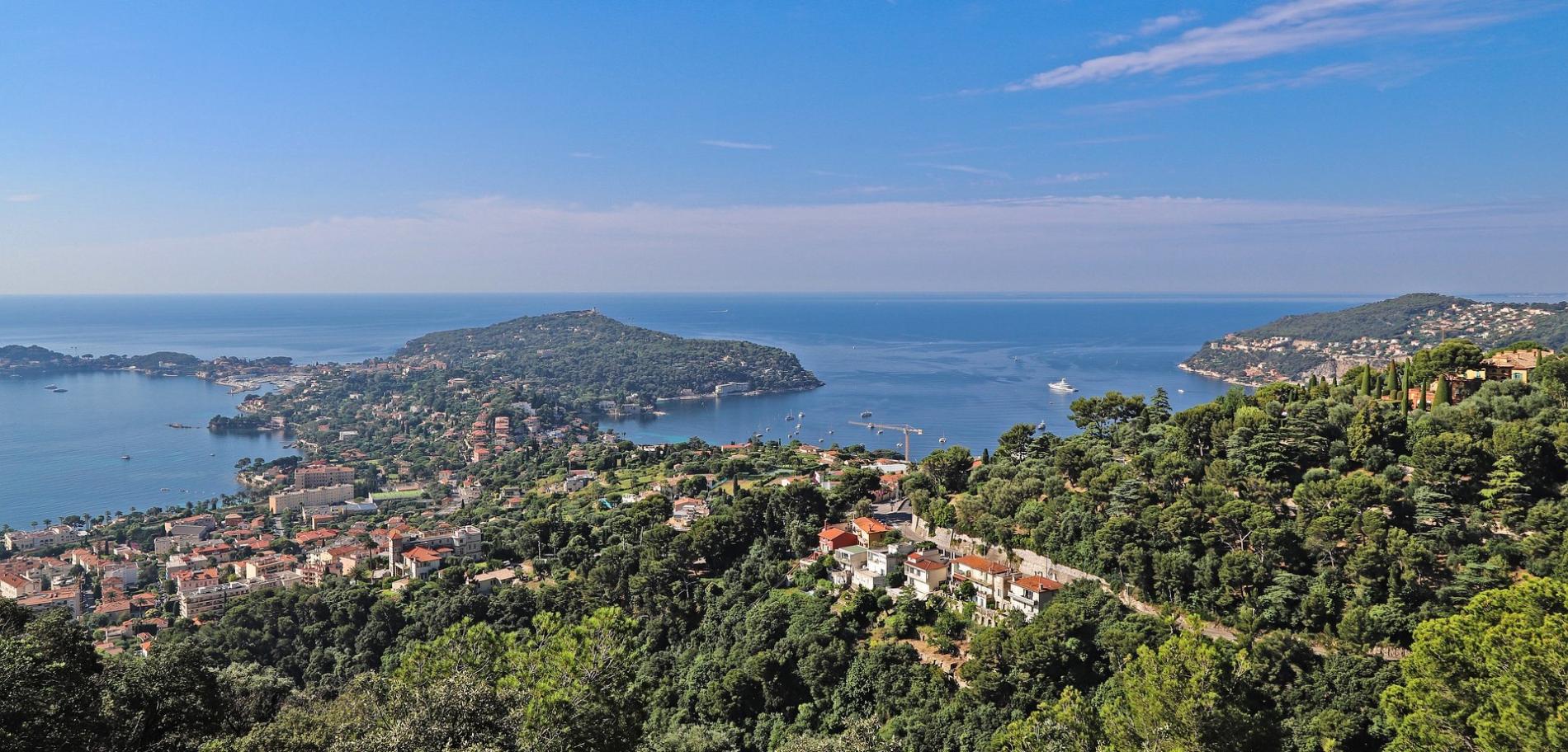 A Staffed Riviera Villa: Yacht Transfers, Beach-Club Tables and Private Chefs 1 Panoramic view of the French Riviera coastline near Cap Ferrat, the setting for a luxury villa rental French Riviera
