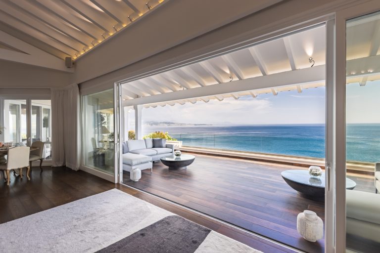 A living room opening onto a terrace and the sea in Corfu
