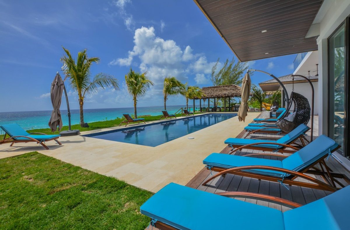 Short Flights from NYC to the Beach: Sun & Sand Fast 3 Asian House pool terrace above the beach on Harbour Island, the Bahamas
