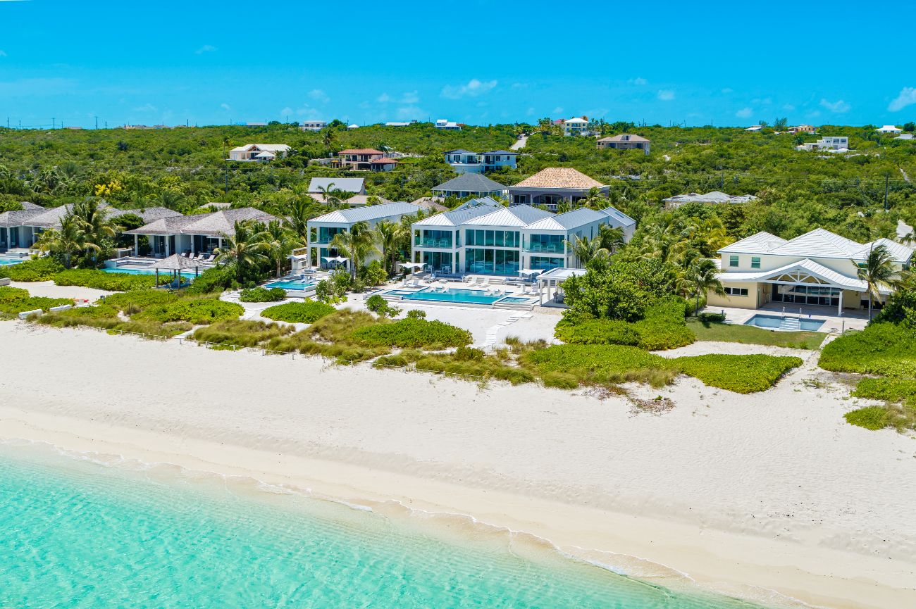 Discover Villa Seaclusion at Grace Bay Resort, Turks and Caicos: a luxurious 9-bedroom retreat with top-tier amenities and services.