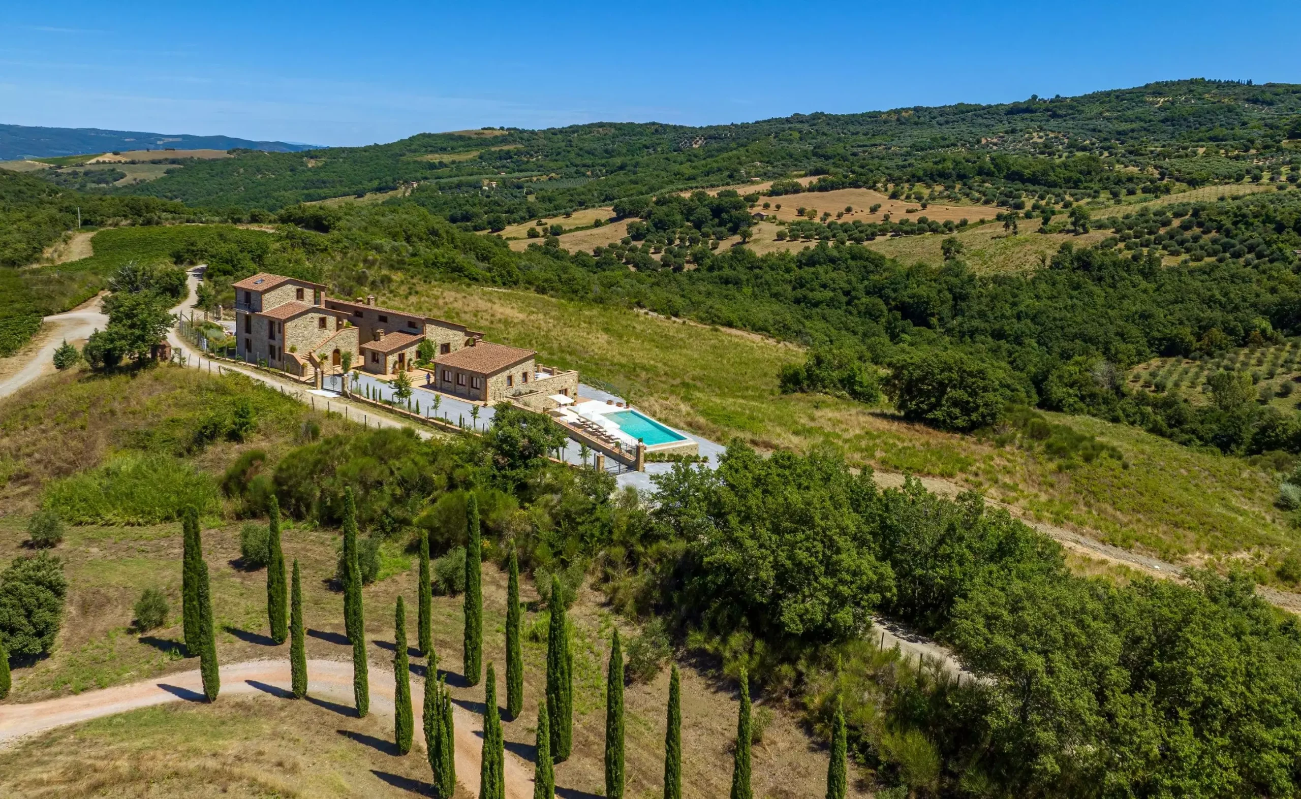 Perched upon the enchanting hills of the Maremma region, Villa Monte Mario immerses you in a breathtaking natural setting