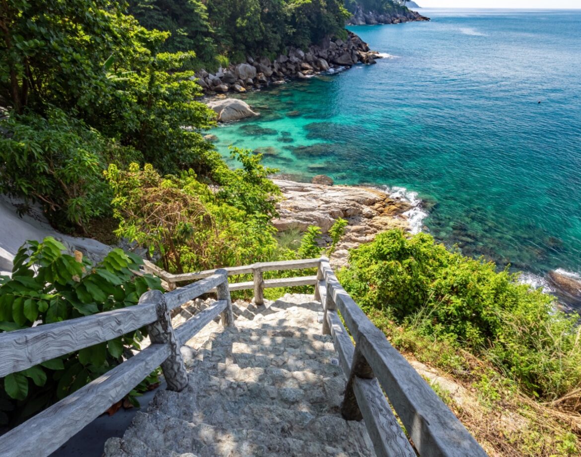 Staircase leading to a serene coastline.