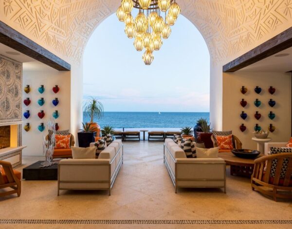 Luxury Villa Rentals and Mansions for Rent | Haute Retreats | 10 Los Cabos villa living room opening onto the ocean