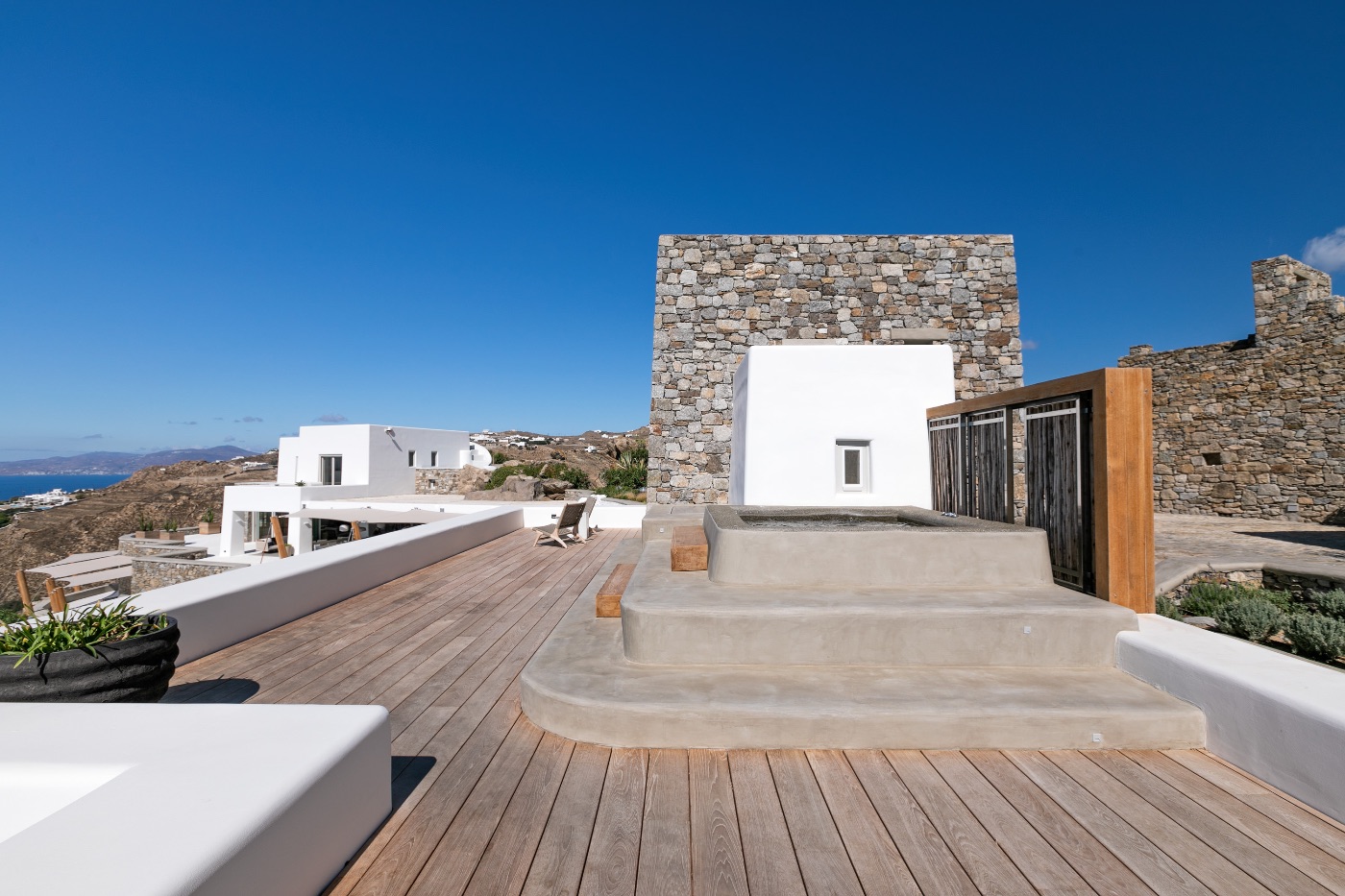 The Luxury Traveler’s Guide on How to Get to Mykonos from USA 4 The Luxury Traveler’s Guide on How to Get to Mykonos from USA - 214 7995 Syros veranda and JacuzziVilla Zeus. Mykonos large villa Haute Retreatsjpg