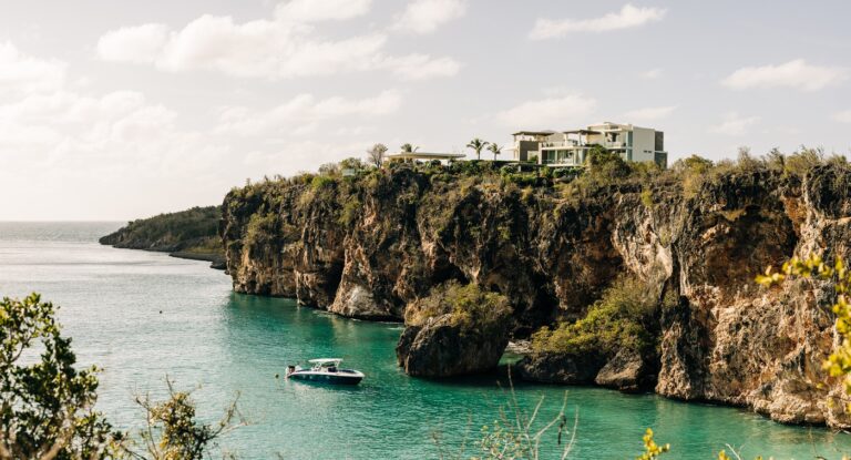&Agrave;NI Anguilla on its cliff above a turquoise bay