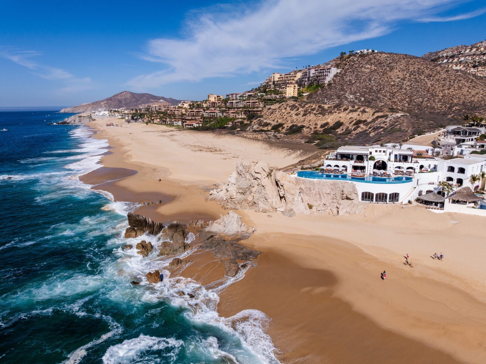Villa La Datcha on the Pacific beach of Pedregal in Los Cabos, with the hills of Cabo San Lucas behind