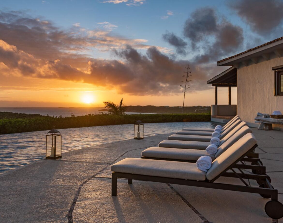 Luxurious sunset by the poolside.