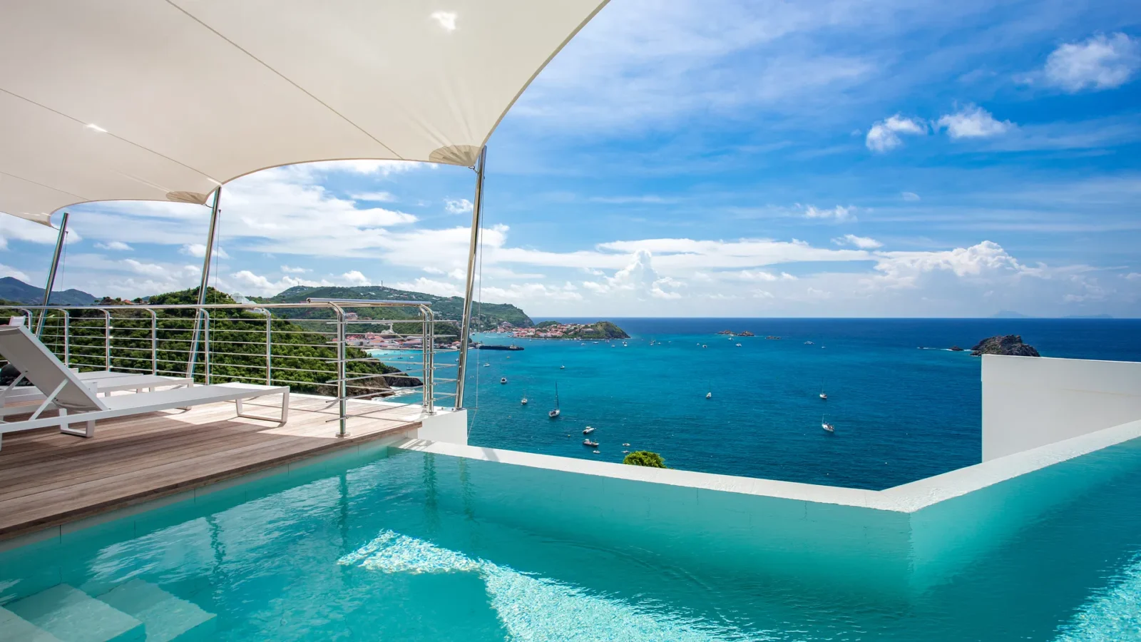 How to Plan a Luxury Honeymoon: A Curated Guide by Haute Retreats 4 How to Plan a Luxury Honeymoon: A Curated Guide by Haute Retreats - st barth villa rental VILLA PASSAGE STBARTS MYVILLAINSTBARTH POOL TERRACE 1.jpg