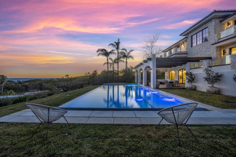 Luxury Villa Destinations Worldwide | Haute Retreats 15 The pool of Malibu Merritt Estate at dusk, with the Pacific beyond