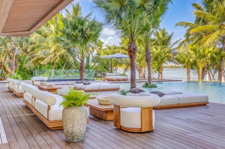 Tropical poolside lounge with palm trees