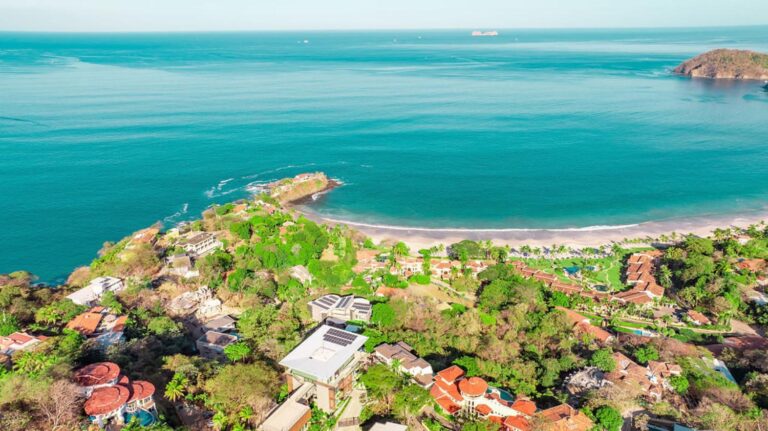 Coastal view with lush greenery.