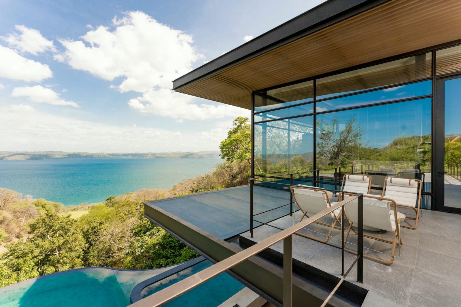 Best Places to Travel With Kids: 15 Luxury Family Destinations for an Unforgettable Escape - villa peninsula papagayo costa rica luxury pool view enoki bal 2 h l