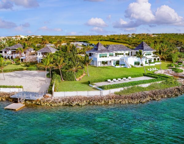 Aerial view of Villa Le Bleu above the water at Little Harbour, Anguilla