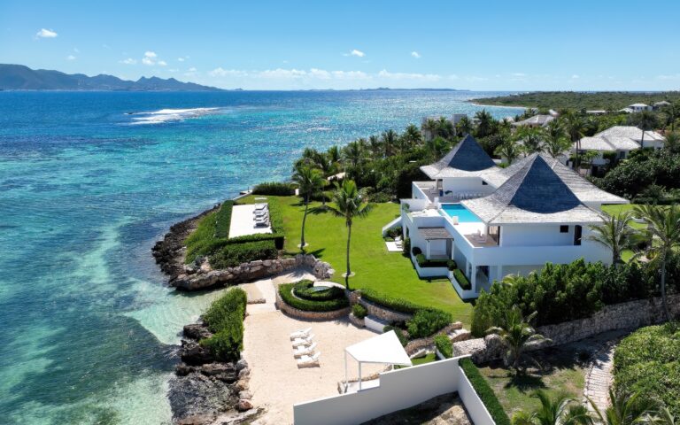 Villa Le Bleu on its point above the clear water of Little Harbour, Anguilla